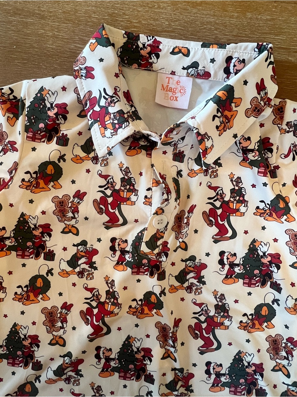 The Magic Box Holiday Character Polo Shirt